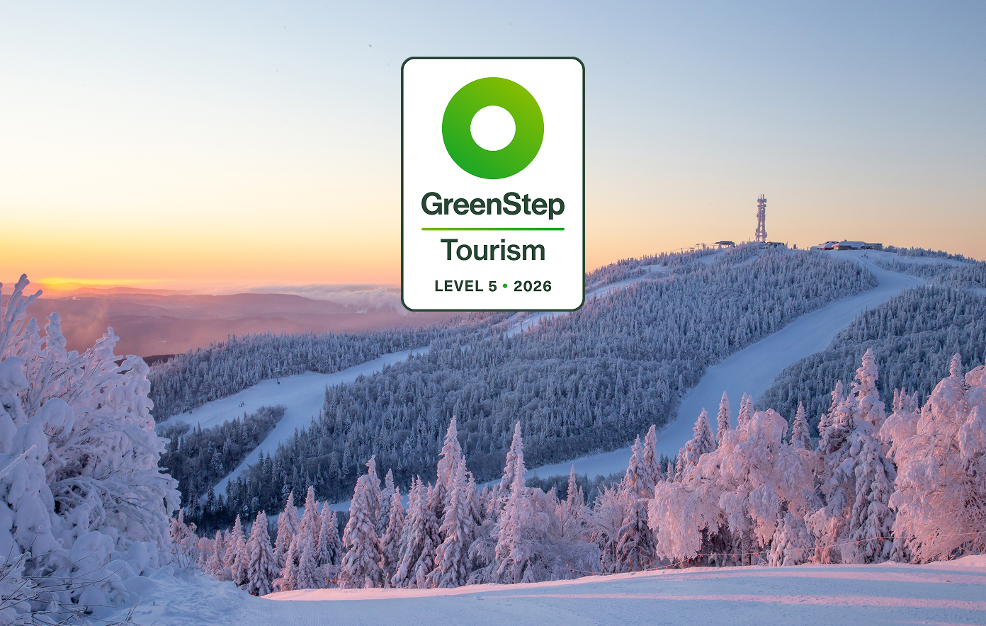 Mont Tremblant summit with eco-responsible logos